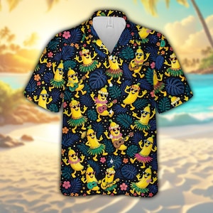 Maglietta hawaiana con banana che ride, divertente maglietta Aloha con banana danzante e motivo di foglie tropicali, ukulele e hula, ideale come regalo per le vacanze al mare e l'estate.