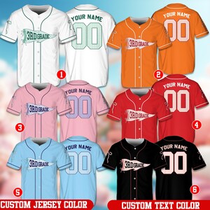 May include: Six baseball jerseys in white, orange, pink, red, light blue, and black, each featuring a front graphic of a pennant with the text 3RD GRADE and a back design with the text YOUR NAME and the number 00 in a checkered pattern.