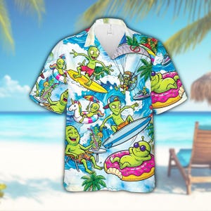 May include: White short-sleeved button-down shirt with a vibrant all-over print featuring cartoon aliens enjoying beach activities. The aliens are surfing, parasailing, and relaxing on inflatable donuts. The shirt has a classic collar and a relaxed fit.