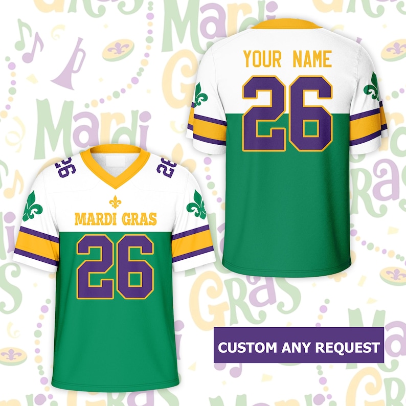 May include: White, green, and gold Mardi Gras jersey with the number 26 in purple. The front of the jersey reads "MARDI GRAS" and has a fleur-de-lis design. The back of the jersey has the text "YOUR NAME". The jersey is a custom design.