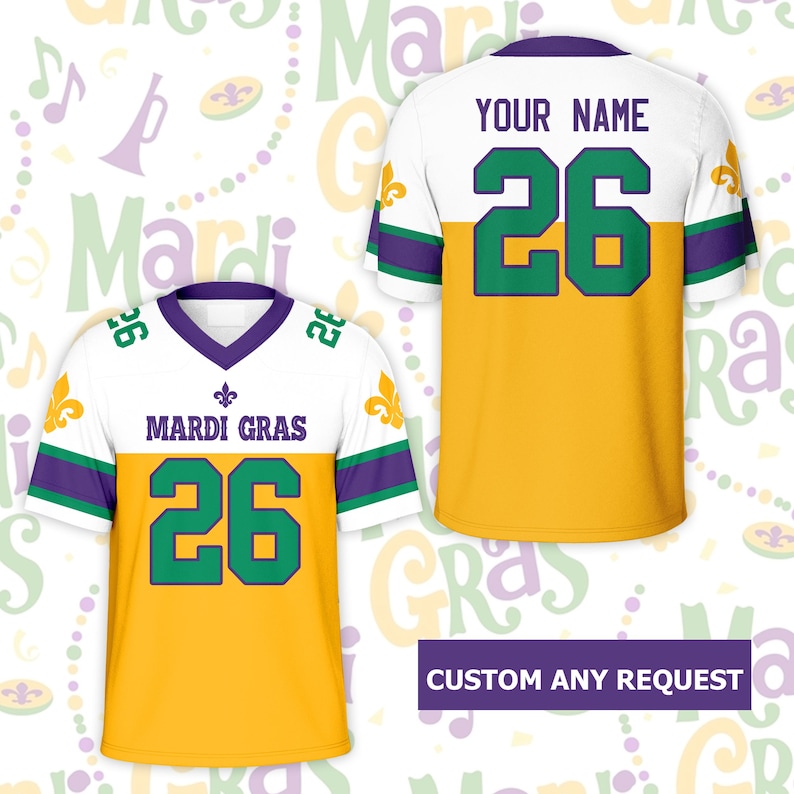 May include: A white, gold, and purple Mardi Gras jersey with the number 26 in green. The front of the jersey reads "Mardi Gras" above the number. The back of the jersey has space for a name and the number 26.