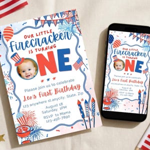 May include: A first birthday invitation in red, white, and blue, featuring fireworks and flags. The text reads "Our Little Firecracker is Turning One." The design is displayed on paper and a smartphone, ideal for a child's first birthday.