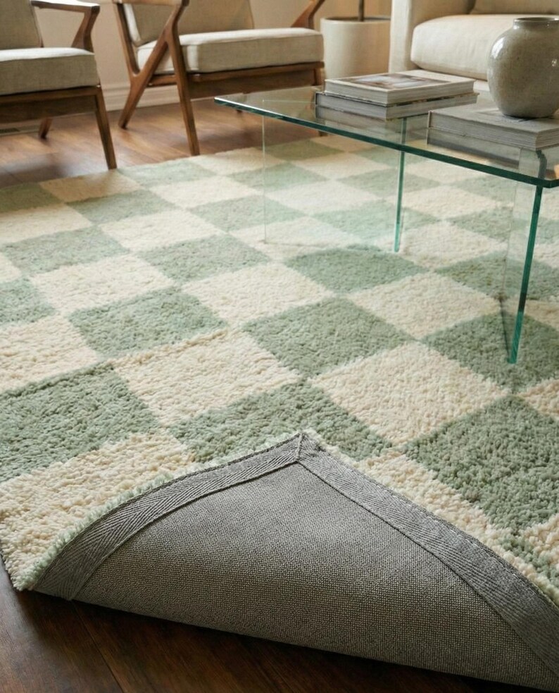 Hand tufted wool rug in neutral beige and grey
Modern living room area rug with soft texture
Plush hand tufted carpet for luxury interiors