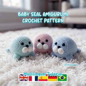 May include: Three crocheted baby seal amigurumi in pastel shades: light blue, pink, and blue. Each seal has black eyes and a white snout. The image includes the text "Baby Seal Amigurumi Crochet Pattern" and "Multilingual Tutorial".