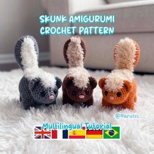 May include: Three crocheted skunk amigurumi in gray, brown, and orange, each with a white stripe and fluffy tail. The text "SKUNK AMIGURUMI CROCHET PATTERN" is displayed above the skunks. The image also includes the text "Multilingual Tutorial".