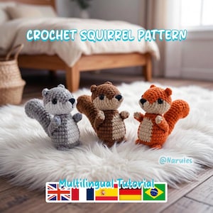 May include: Three crocheted squirrel figurines in gray, brown, and orange, each with a fluffy tail and small arms. The text "CROCHET SQUIRREL PATTERN" is displayed above the squirrels. The image also includes the text "Multilingual Tutorial".