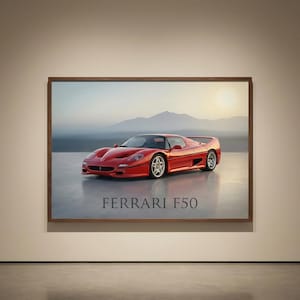 May include: A framed print of a red Ferrari F50 sports car. The car is positioned on a reflective surface, with the text "FERRARI F50" below. The background features a mountain range under a soft, diffused light.