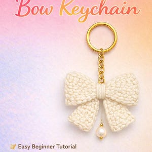 May include: A cream-colored crocheted bow keychain with a gold-colored ring and chain. The keychain has a pearl bead charm. Text on the image reads "CROCHET PATTERN PDF Bow Keychain" and "Easy Beginner Tutorial".