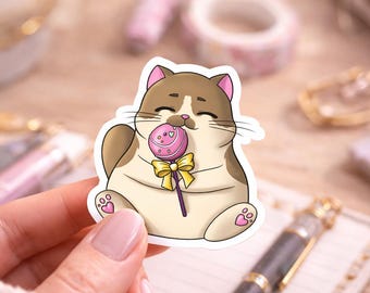 Schattige kattensticker | Leuk katje met lolly – Kawaii snoepkat decoratie – Glanzende laptopsticker