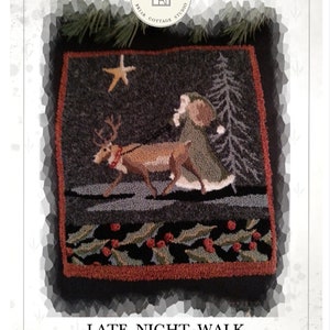 May include: Punch needle pattern for a late night walk with a person and a reindeer in a snowy forest. The pattern features a person in a green coat walking a reindeer with a red collar. The background is a dark forest with a star in the sky. The pattern is surrounded by a red border.