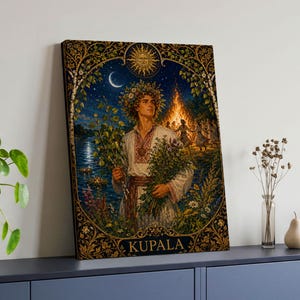 May include: A rectangular canvas print featuring a central figure wearing a floral crown and traditional white embroidered clothing, holding greenery. The scene includes a bonfire, a crescent moon, a sun, and the text KUPALA in a gold frame.