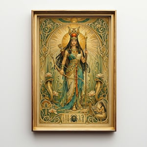 May include: A framed art print featuring an Egyptian goddess with a bow and arrow, spear, and headdress. The artwork has a gold frame and a detailed, colorful design with snakes, lotus flowers, and hieroglyphs. The color palette includes gold, teal, and cream.