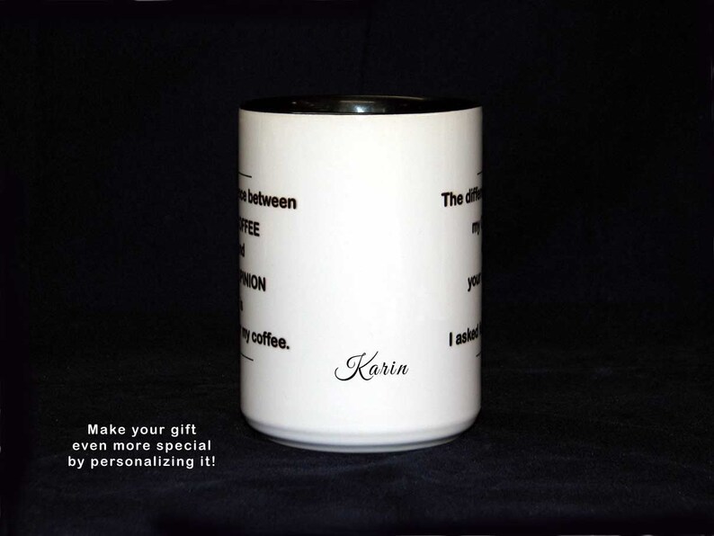 May include: White ceramic coffee mug with black rim and handle. The mug has black text that reads "The difference between my opinion and your opinion is that I asked for my coffee." The name "Karin" is written in cursive at the bottom of the mug.