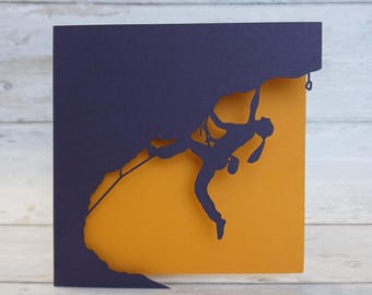 Tarjeta de escaladora cortada a láser: Aventura hecha a mano en papel recortado