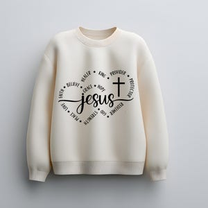 May include: A white ceramic mug with a black handle and the text "But First, Coffee" in a black, handwritten-style font. The mug is on a white surface.