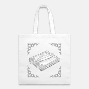 May include: White tote bag featuring a detailed black and white illustration of a vintage book with a feather quill on top. The design is framed by decorative corner elements.