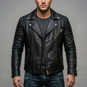 May include: Black leather motorcycle jacket with a snakeskin texture, featuring a notched collar, asymmetrical zipper, and quilted shoulder detailing. The jacket has multiple zippered pockets and a belt at the waist.