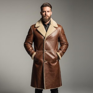 May include: A brown leather coat with a shearling collar and lining. The long coat has a button-up front, two pockets, and shearling trim on the cuffs. The coat is worn over a black shirt.