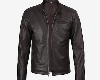 May include: A dark brown leather jacket with a stand-up collar and a full-length zipper. The jacket has a small chest pocket on the left side and long sleeves. The jacket is a classic style.