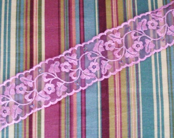 Pink Venice Lace Embroidery Trim On Pink Organza Fabric 2 3/4 Inches Wide.