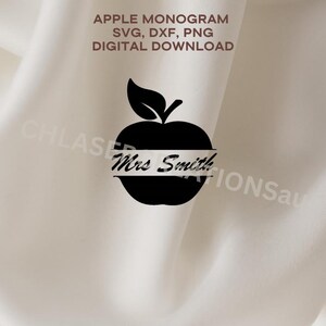 May include: Black apple monogram design with the text "Mrs Smith" in a white banner. The image includes the text "APPLE MONOGRAM SVG, DXF, PNG DIGITAL DOWNLOAD" in the upper left corner. The background is a cream-colored fabric.