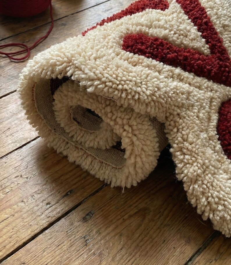Hand-tufted wool floor rug with custom CSS code design, perfect for modern geeky home décor. Soft and cozy underfoot, this personalized rug adds a unique tech-inspired accent to living rooms, bedrooms, or offices. A stylish, functional piece that merges contemporary design with playful coding aesthetics for tech-savvy homeowners
