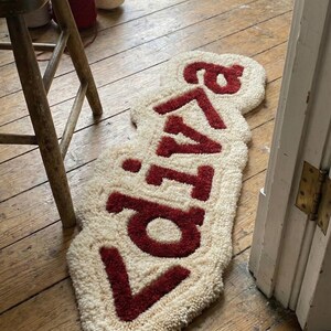 Modern tech-inspired hand-tufted wool rug featuring CSS code motifs, ideal as a personalized door mat or floor accent. Soft, plush, and durable, this geeky rug elevates living rooms, bedrooms, or office spaces with contemporary charm. A unique statement piece that combines comfort, style, and playful tech-themed design in one functional mat.