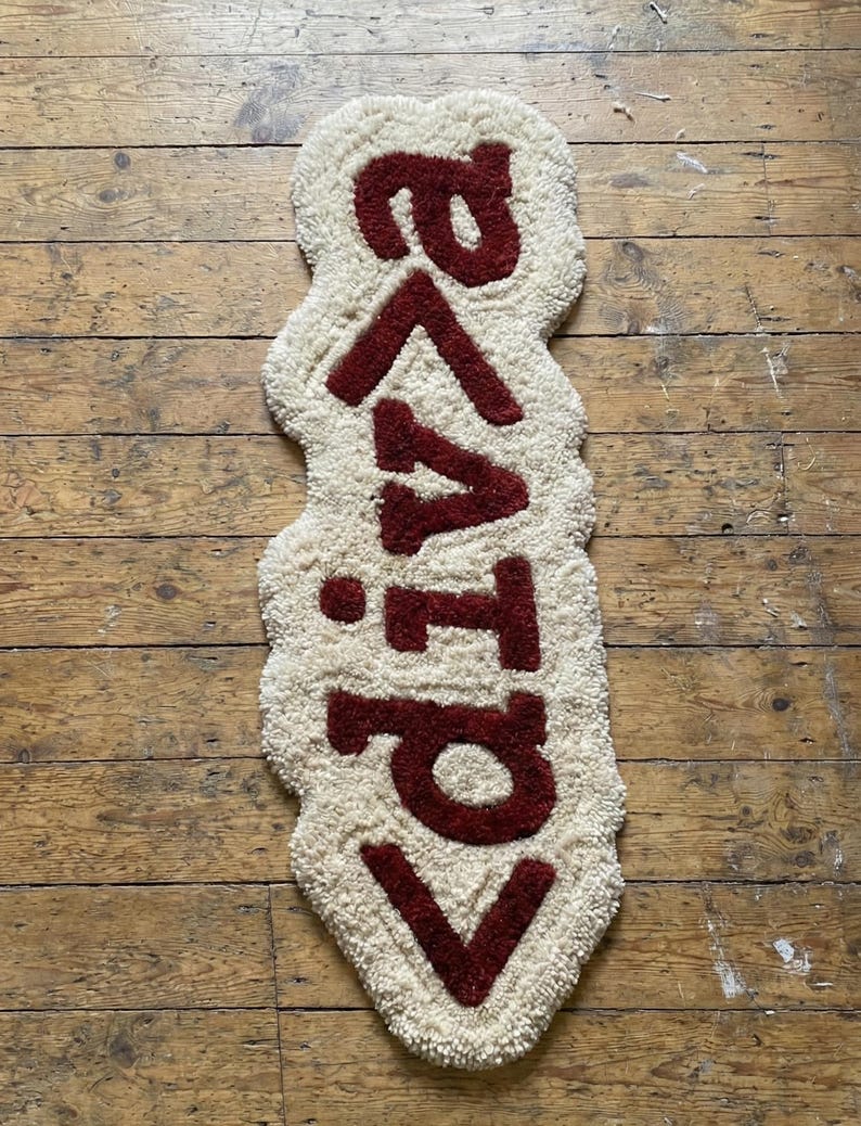 Personalized CSS code-inspired hand-tufted wool rug, perfect as a geeky floor accent or stylish door mat. Soft, high-quality wool ensures comfort underfoot, while the modern design adds a playful tech aesthetic to living rooms, bedrooms, or offices. A unique decorative piece for tech enthusiasts and contemporary home décor lovers alike.