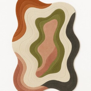 May include: A modern, abstract rug with a unique, organic shape. The rug features layered, wavy patterns in shades of brown, beige, green, and black. The design creates a sense of depth and visual interest, suitable for a living room or bedroom.