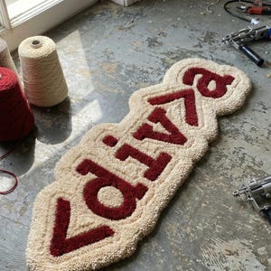 Geeky, tech-inspired hand-tufted wool rug featuring CSS code design, ideal as a personalized floor mat for living rooms, bedrooms, or offices. Soft and plush, this modern rug combines comfort and style, bringing a unique, playful tech aesthetic to contemporary home décor while serving as a functional, eye-catching accent piece.