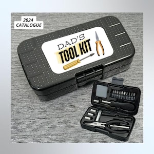 May include: A black tool kit with the text "DAD'S TOOL KIT" on the lid. The kit includes a screwdriver, pliers, and other tools. The open kit reveals additional tools. The text "2024 CATALOGUE" is in the upper left corner.