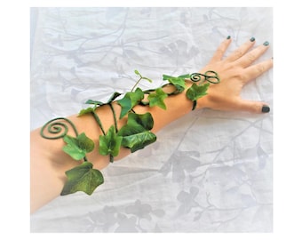 Spiralärmmanschett, corsage med gröna blad, kostymtillbehör med giftmurra och skogsfe.