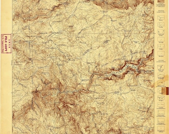May include: A vintage U.S. Geological Survey topographic map of the Yosemite sheet in California. The map features brown contour lines, black text, and a legend on the right side. It includes multiple red ink stamps labeled FILE COPY.
