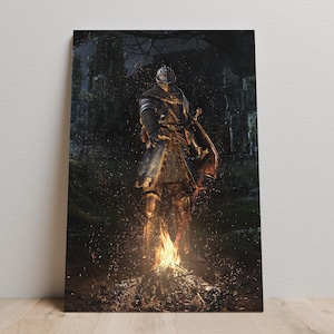 May include: A canvas print depicting a knight in full armour standing near a bonfire. The knight is clad in silver and gold armour, holding a sword and shield. The background shows a dark forest with a castle in the distance, with sparks and embers in the air.