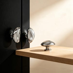 May include: A set of three ceramic mugs with a speckled, matte finish. The mugs are in shades of cream, light gray, and dark gray. Each mug has a simple, minimalist design, perfect for coffee or tea.