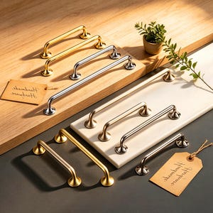 May include: A set of three ceramic mugs with a speckled, matte finish. The mugs are in shades of cream, light gray, and dark gray. Each mug has a simple, minimalist design, perfect for coffee or tea.