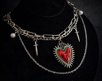 Bleeding Heart Gothic Necklace – Stainless Steel Sacred Heart Statement Chain with Daggers & Pearl Accents