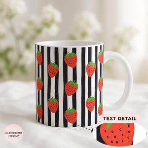 May include: A white ceramic mug featuring a repeating pattern of red strawberries on vertical black stripes. The surface of one strawberry contains the black text FUCK THIS SHIT arranged in a grid. The mug has a curved handle on the right side.