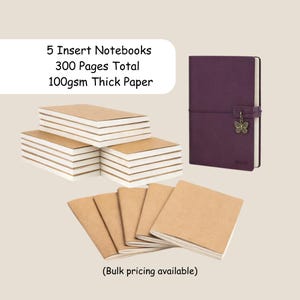 May include: A set of insert notebooks with 300 pages of 100gsm thick paper. The image shows a purple journal with a butterfly charm and the word "MOM" embossed on the cover, along with stacks of insert notebooks.