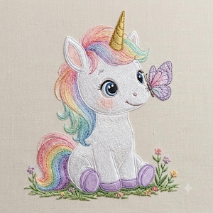 May include: An embroidered design of a white unicorn with a gold horn, a rainbow-colored mane and tail, and large blue eyes. The unicorn sits in green grass with small flowers, while a purple butterfly rests on its nose, all on fabric.