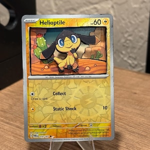 pokemon helioptile card Helioptile (37/131) [Sun & Moon: Forbidden Light] – Darkwater Games