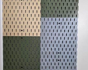 Infinite-Flow Skadis wall panel system.  Single panel (Screw mounting)