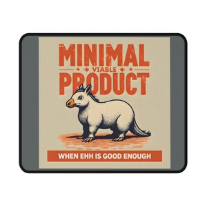 May include: A rectangular mousepad featuring a cartoon aardvark illustration on a tan background. The text "MINIMAL VIABLE PRODUCT" is above the aardvark, with "WHEN EHH IS GOOD ENOUGH" below. The mousepad has a grey border.