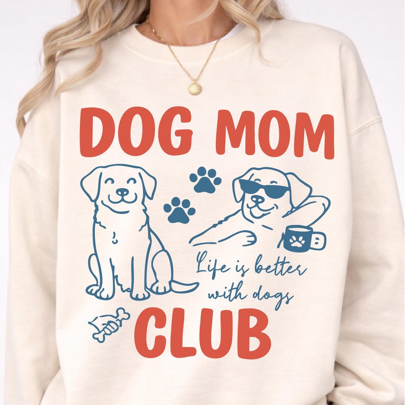 Model wearing a Dog Mom t-shirt with playful dog graphics and bold typography. Perfect for dog moms, pet owners, and animal lovers. Ideal for everyday outfits and custom apparel shops.