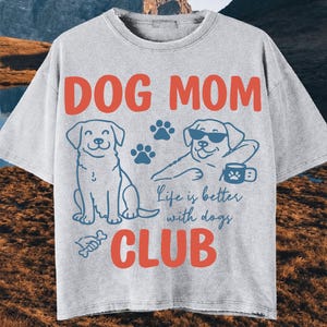Model wearing a Dog Mom Club sweatshirt featuring cute dog illustrations, paw prints, and “Life is better with dogs” quote. Great for cozy outfits, pet lovers, and dog mom gifts.