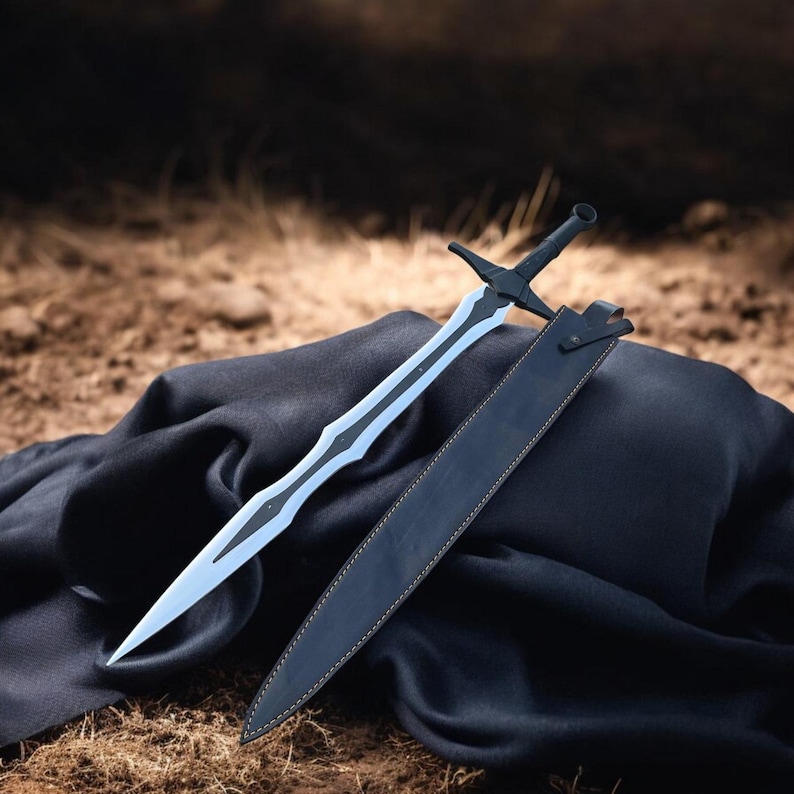May include: A black sword with a silver blade and a matching black sheath. The sword is lying on a black cloth, with a brown background. The sword has a unique design.