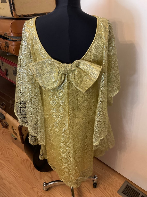 BAT WING DRESS DRIPPING IN DECADENCE