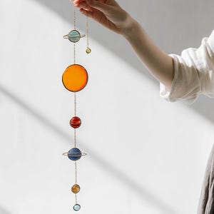 May include: A rustic wooden sign with the text "Welcome to our home" in white lettering. The sign features a distressed finish and a simple, inviting design, perfect for entryway decor.