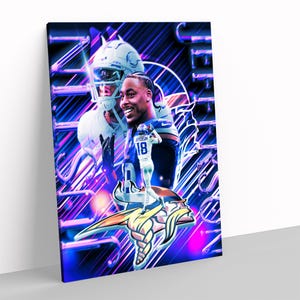 May include: A canvas print featuring a digital art design of a football player in a blue and white uniform. The artwork includes the team logo and a background with neon blue and purple lines.