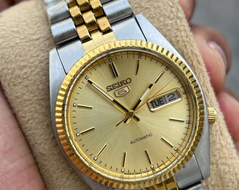 Reloj automático vintage Seiko 5 con bisel estriado para hombre 7009-3110